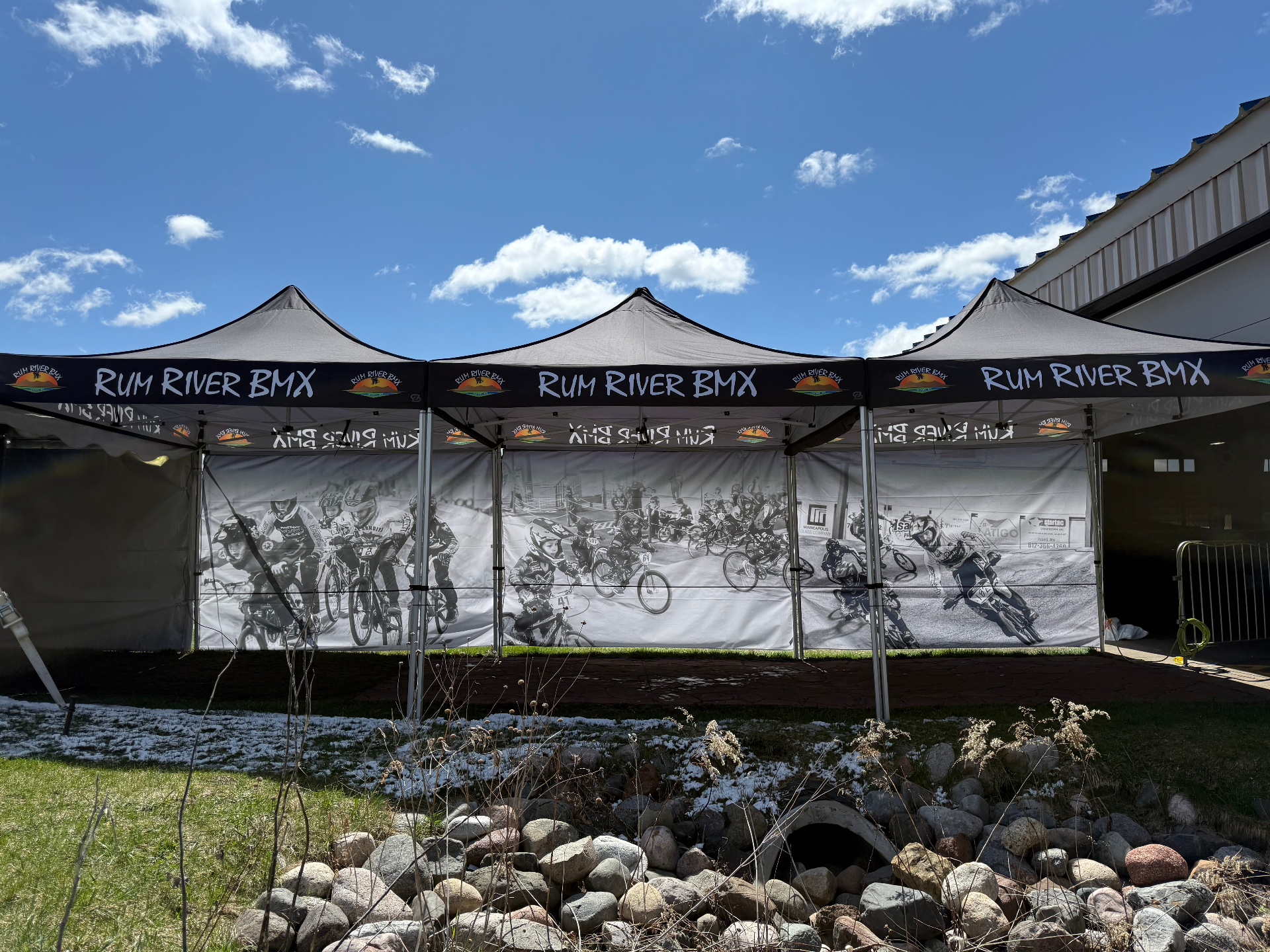 Rum River BMX branded pop-up tents — exterior