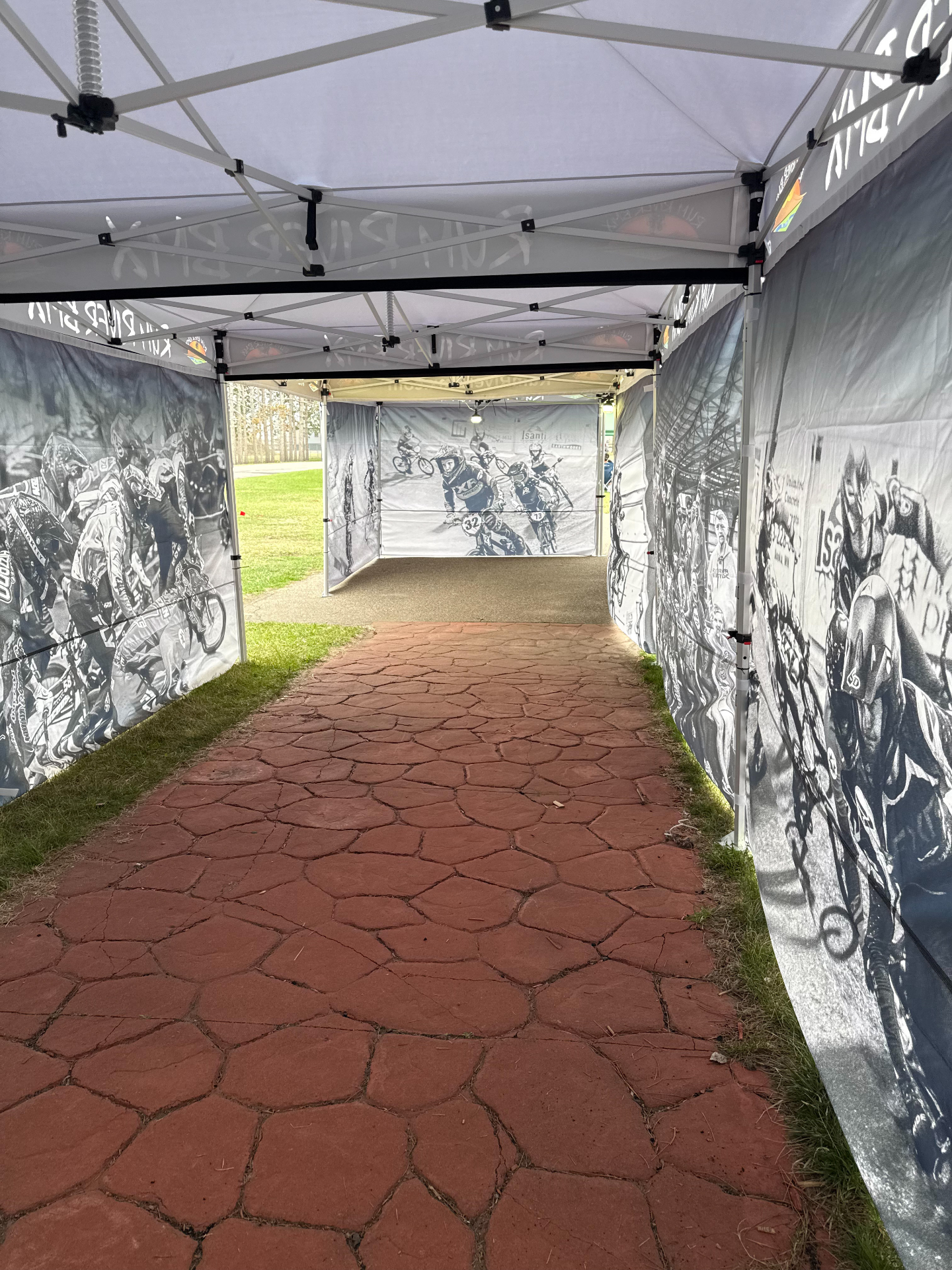 Rum River BMX tent interior with printed rider walls